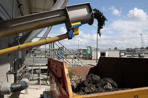 conveyer belt putting waste into bin